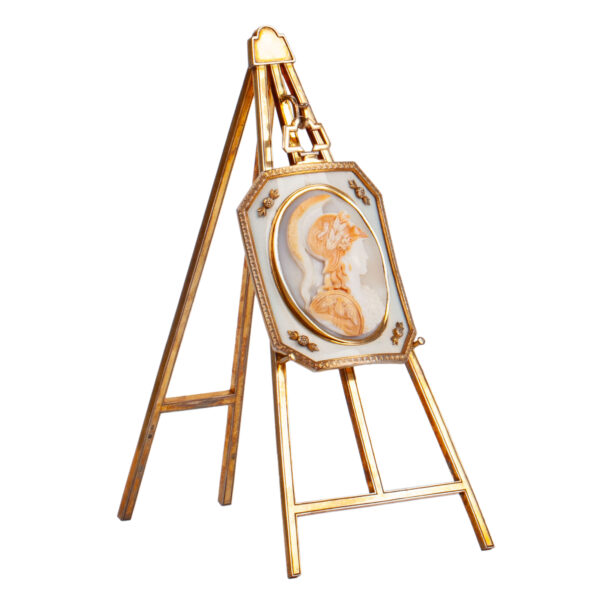 Lot 0131 <br/>A very rare Fabergé medallion with a Minerva cameo on a stand in the shape of an easel <br/>Estimate: 35000-45000€