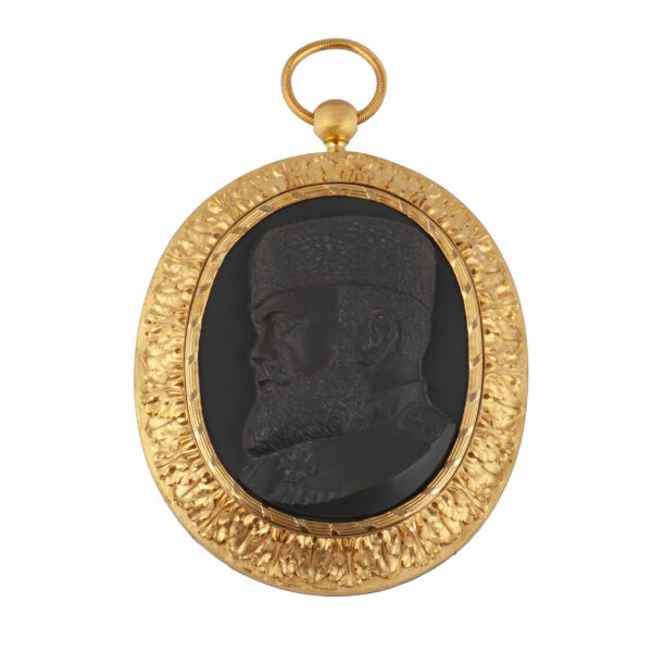 Lot 0145 <br/>A Russian brass and carved kalgan jasper bass relief with Emperor Alexander III <br/>Estimate: 5000-7000€