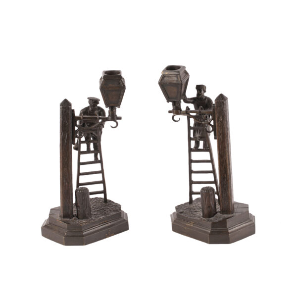 Lot 0015 <br/>A pair of Russian bronze candlesticks “Lamplighters” <br/>Estimate: 2000-2500€