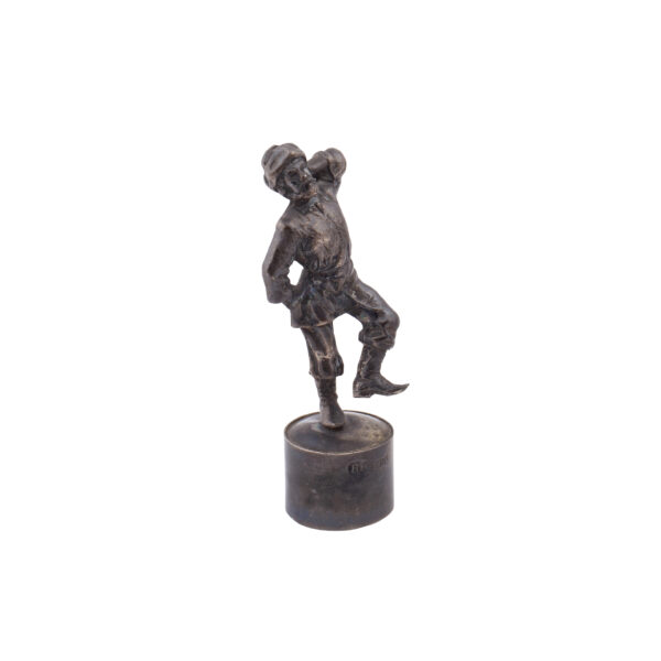 Lot 0184 <br/>A Russian cast silver bottle stopper "Dancing Peasant" <br/>Estimate: 500-700€