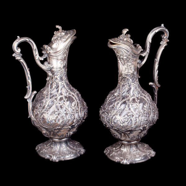 Lot 0060 <br/>An impressive Faberge silver-gilt and cut glass pair of decanters <br/>Estimate: 35000-45000€