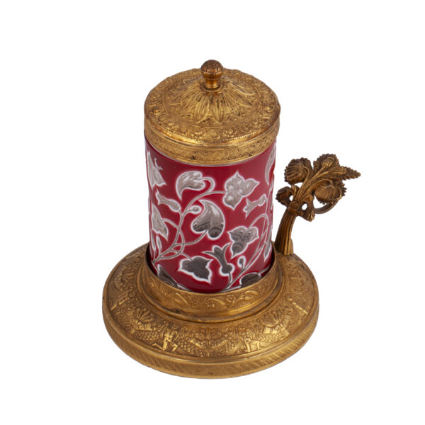 Lot 0075 <br/>A Russian brass-gilt glass holder with enameled glass inlay <br/>Estimate: 10000-12000€