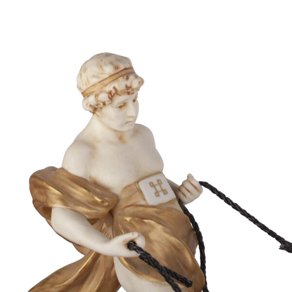 Lot 0094 <br/>A Royal Dux Bohemia porcelain figure group of a youth riding a chariot <br/>Estimate: 600-700€ - Image 3