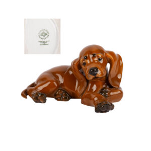 Lot 0138 <br/>Rosenthal Porcelain Figure of a Seated Dachshund, Germany, Hand-Painted <br/>Estimate: 150-200€
