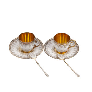 Lot 0175 <br/>Pair of Russian Silver-Gilt Coffee Cups with Saucers and Spoons, Gustav Klingert, Moscow, 1908–1917 <br/>Estimate: 1800-2500€