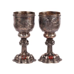 Lot 0186 <br/>Pair of Russian Commemorative Silver Goblets with Views of Moscow and St Petersburg, Y. Rabinovich, Vilnius, 1896 <br/>Estimate: 12000-15000€