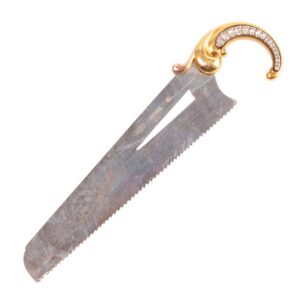 Lot 0189 <br/>Fabergé Extremely Rare Gem-Set Silver and Gold Cigar Cutter in the Form of a Saw, St Petersburg, c. 1890 <br/>Estimate: 15000-17000€
