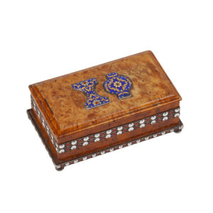 Lot 0232 <br/>Russian Karelian Birchwood Box with Polychrome Enamel Monogram “HF”, Andrei L. Perestronin, Vyatka, 1899–1908 <br/>Estimate: 1200-1500€