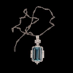Lot 0254 <br/>Art Deco Style Platinum, Aquamarine and Diamond Pendant Necklace <br/>Estimate: 25000-30000€