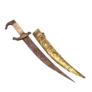 Lot 0382 <br/>North African Islamic Dagger with Brass Scabbard. 19th–20th century <br/>Estimate: 100-200€
