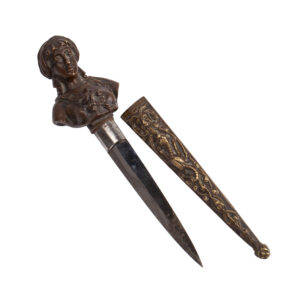 Lot 0386 <br/>Romantic Revival Paper Knife in the Form of a Dagger with Female Head <br/>Estimate: 500-800€