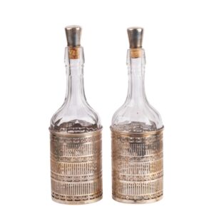 Lot 0059 <br/>Pair of Sterling-Mounted Decanters Made for Tiffany & Co., New York, Early 20th Century <br/>Estimate: 3000-3500€