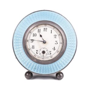 Desk clock with silver on legs — image 1