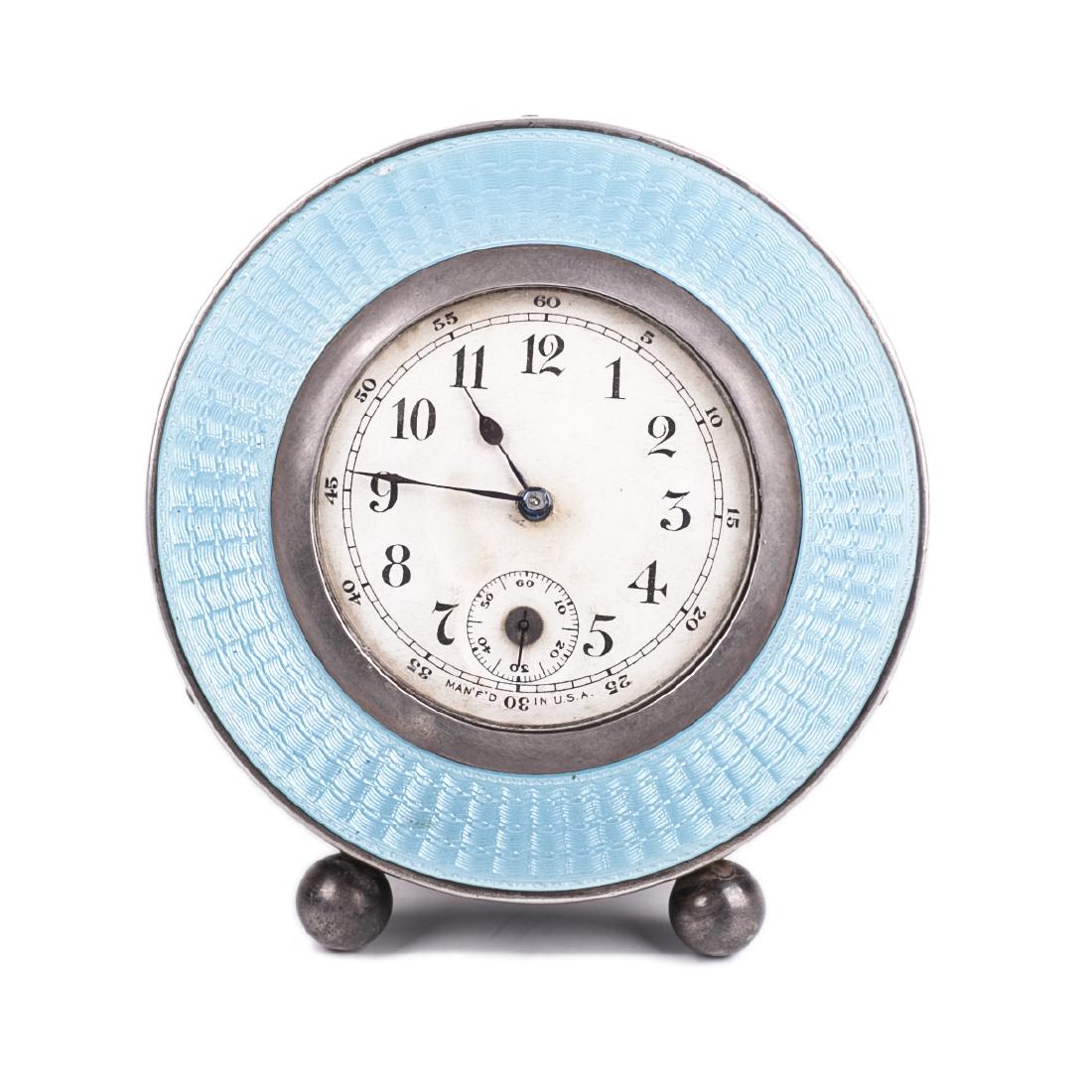 Desk clock with silver on legs — image 1