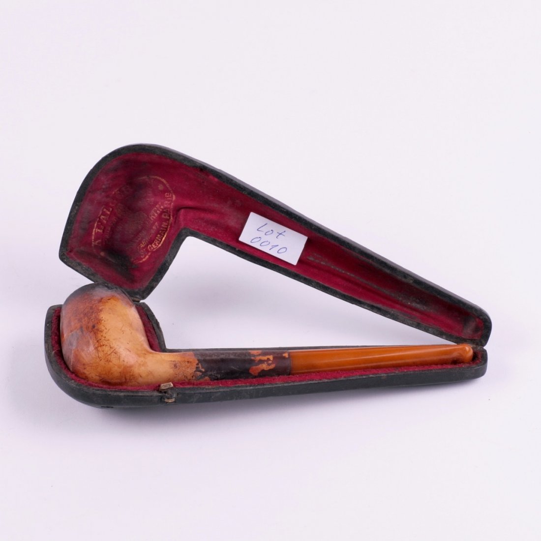 Antique smoking pipe with amber in case. — image 1