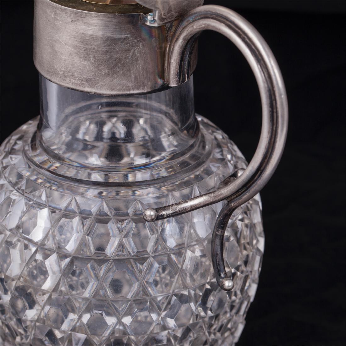 A pair of Faberge silver and cut-glass carafes — image 2