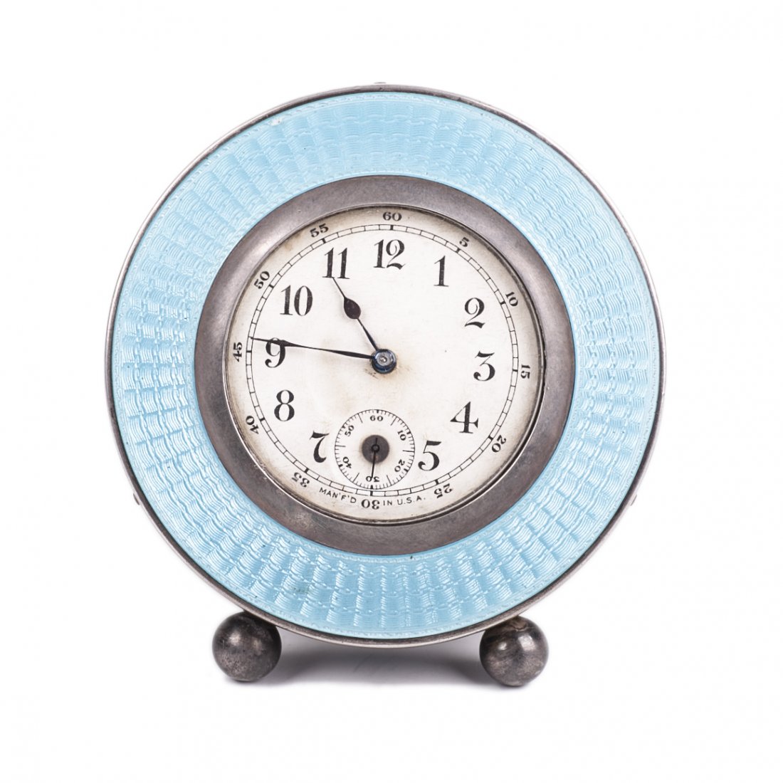 Desk clock with silver on legs — image 1