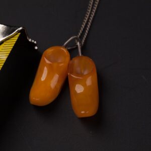 Amber "shoes" pendant with silver chain. — image 3