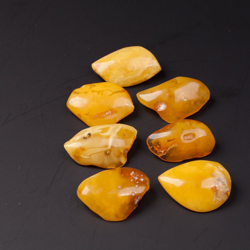 Set of antique amber brooches. — image 1