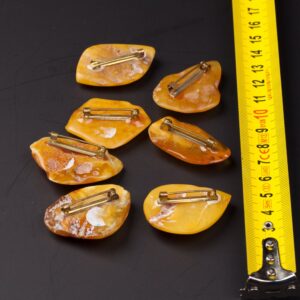 Set of antique amber brooches. — image 2