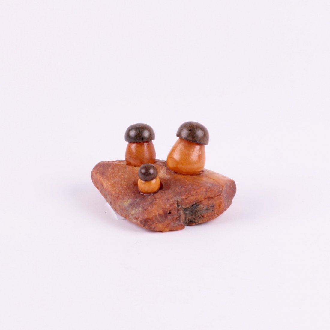 Amber in shape of mushrooms. — image 1