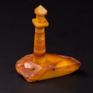 Amber in shape of a lighthouse. — image 1
