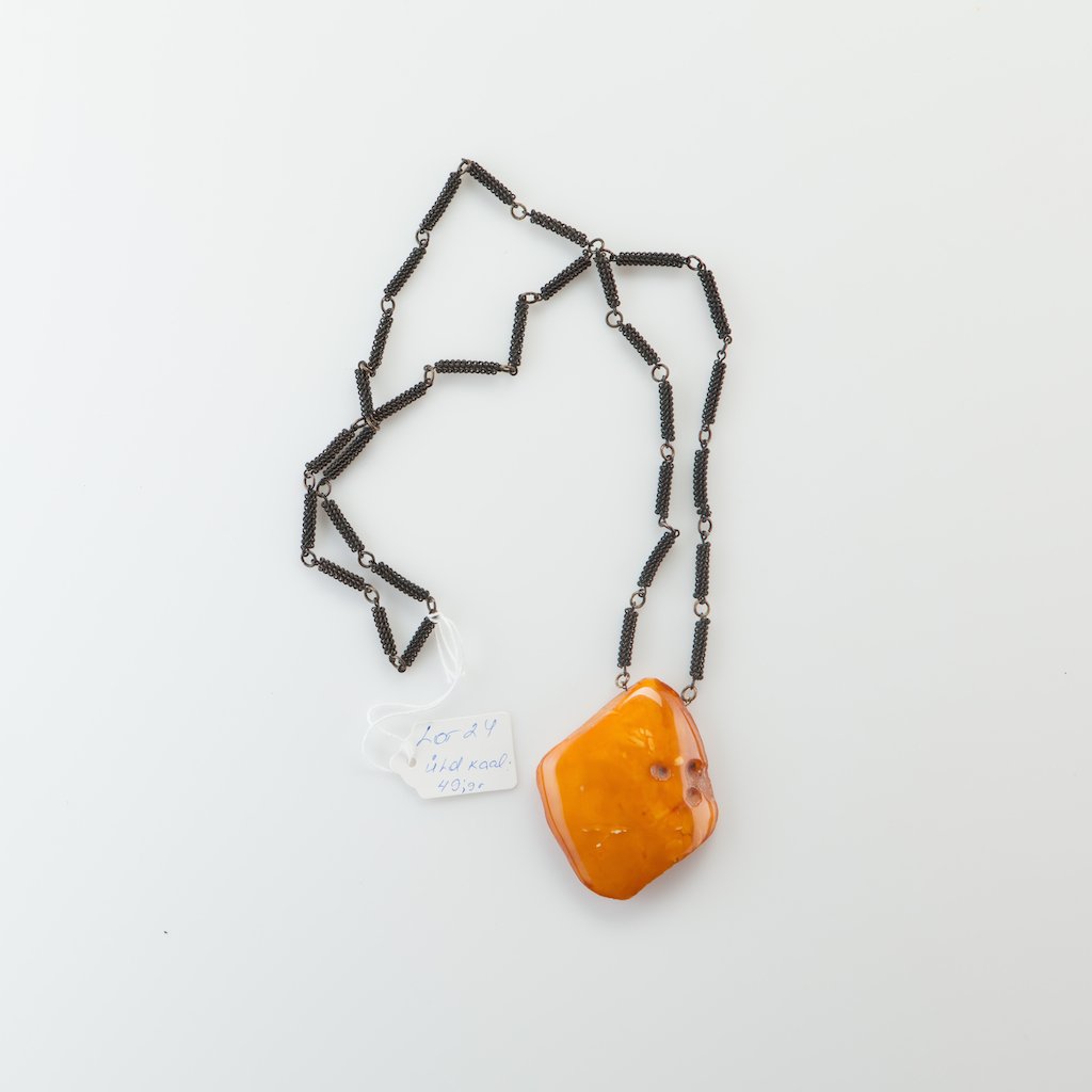 Natural Baltic Amber stone with chain. — image 1