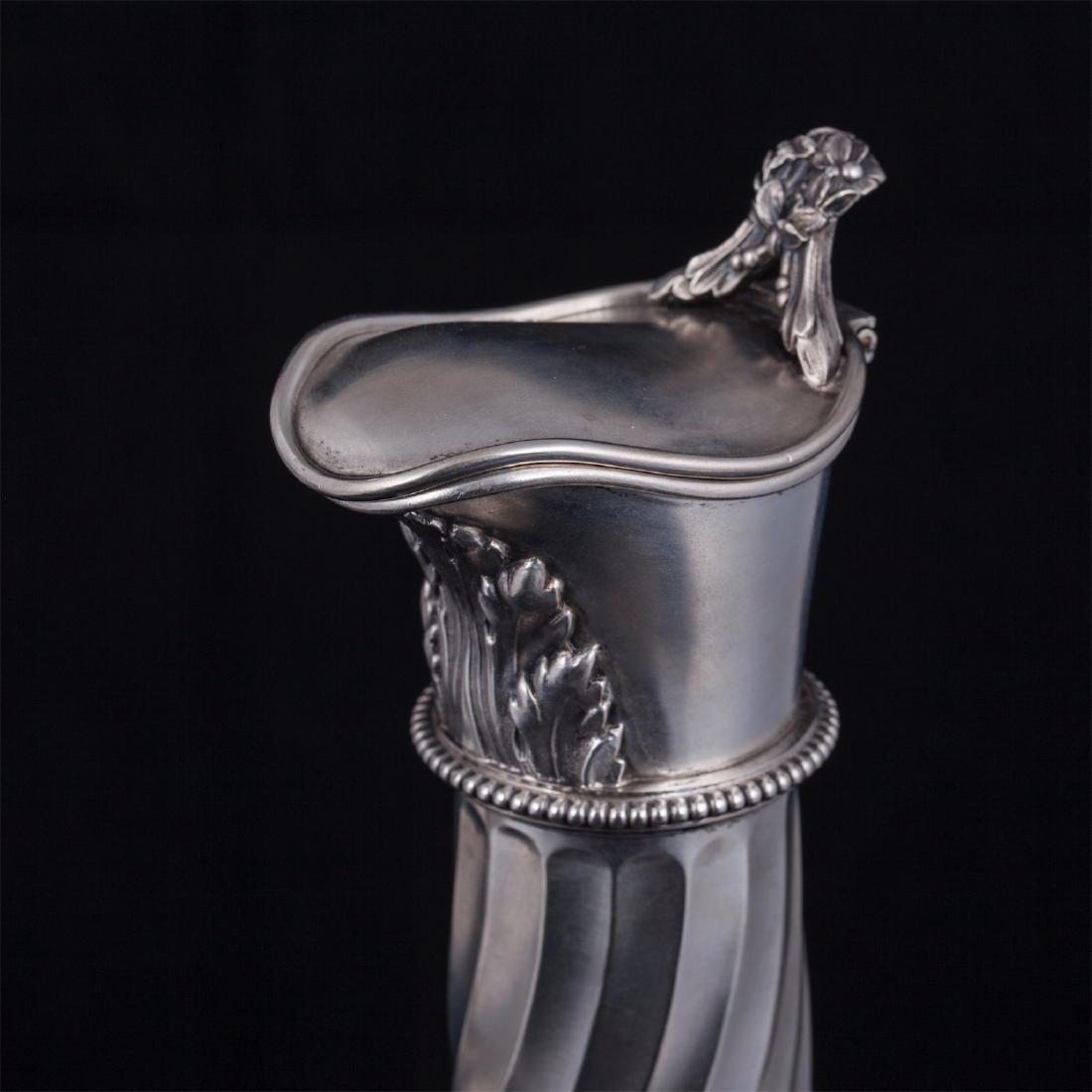 A pair of Faberge silver and cut-glass carafes — image 2