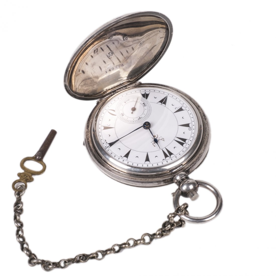 Silver pocket watch with the key — image 1