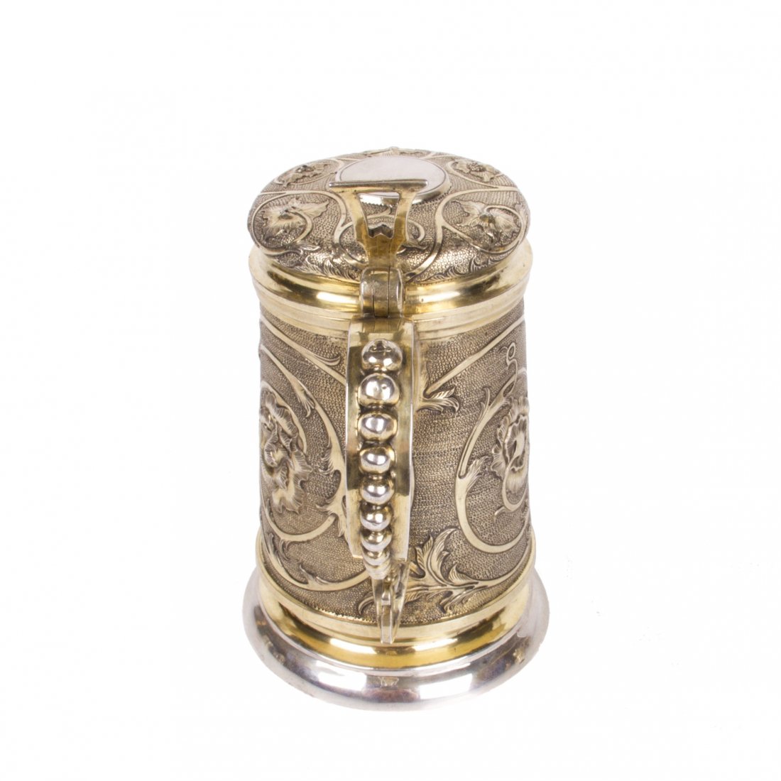 Massive silver-gilt tankard with floral decor — image 4