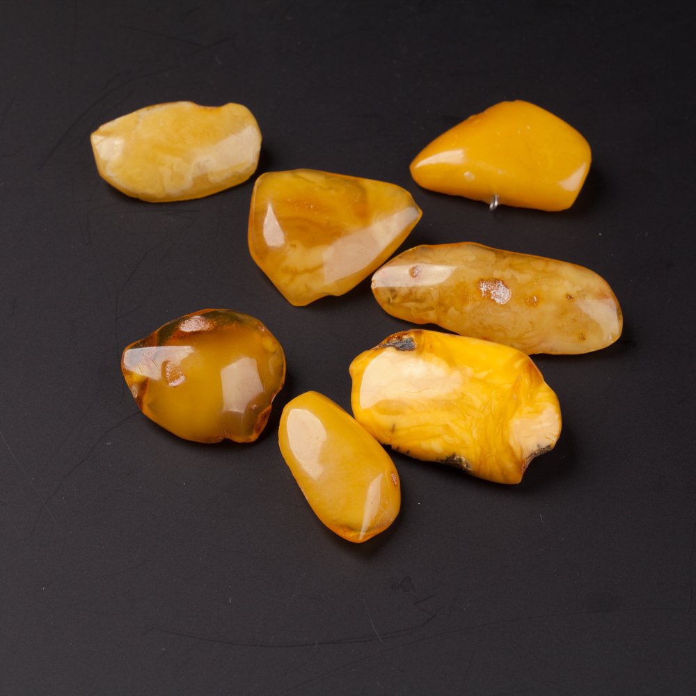 Set of antique amber brooches. — image 1