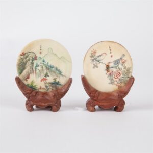 Chinese signed pictures on the stand. — image 1