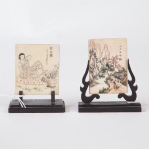 Chinese signed pictures on the stand. — image 1