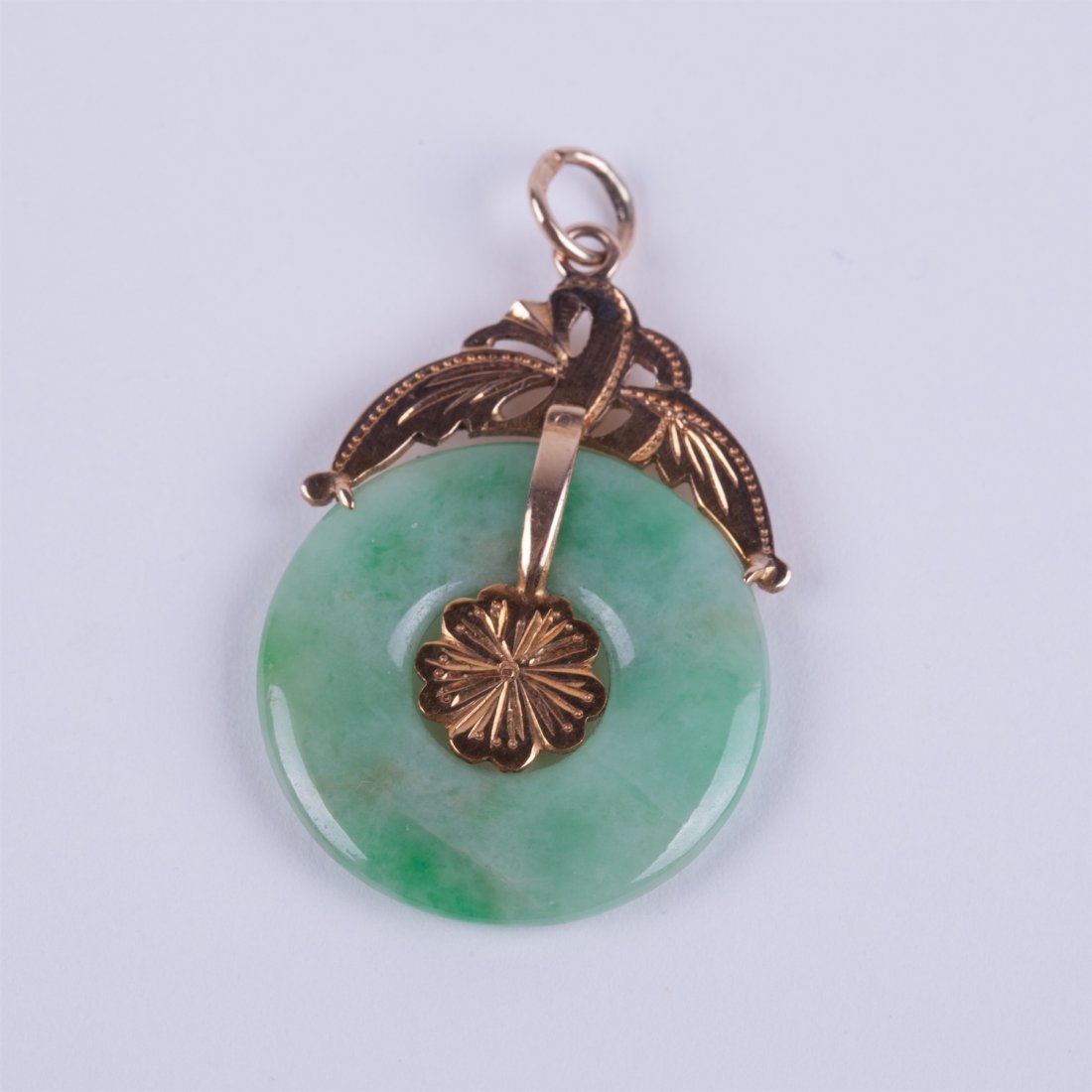 Jade pendant with gold 9K. . — image 1