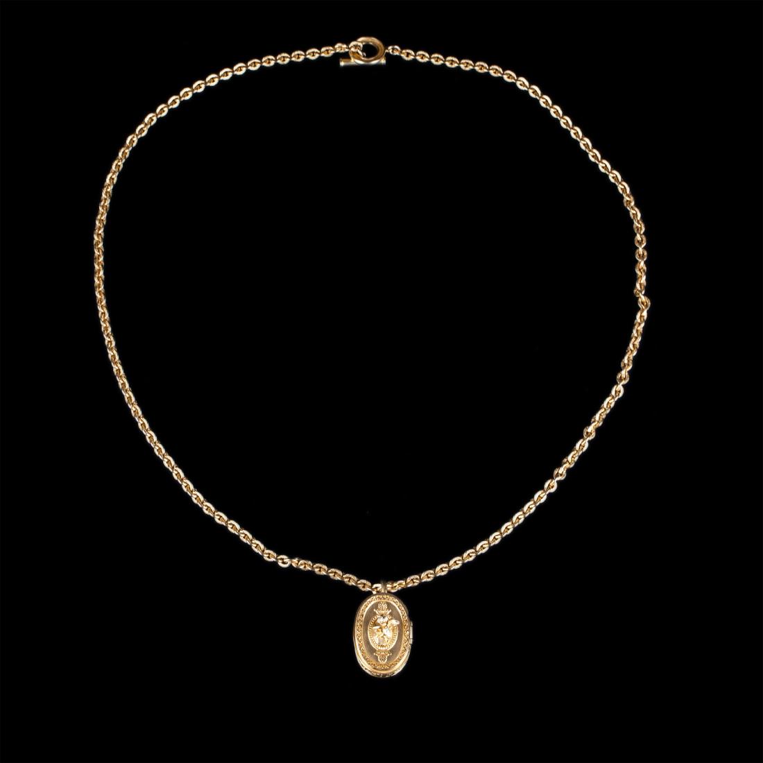 Karl Lagerfeld gilt pendant - pill box with chain — image 1