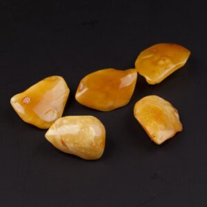 Set of antique amber brooches. — image 1
