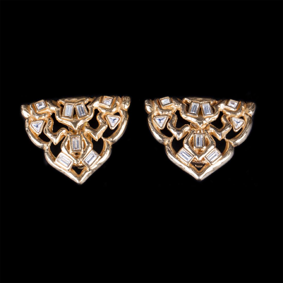 Yves Saint Laurent gilt metal earclips. 1970s. — image 1