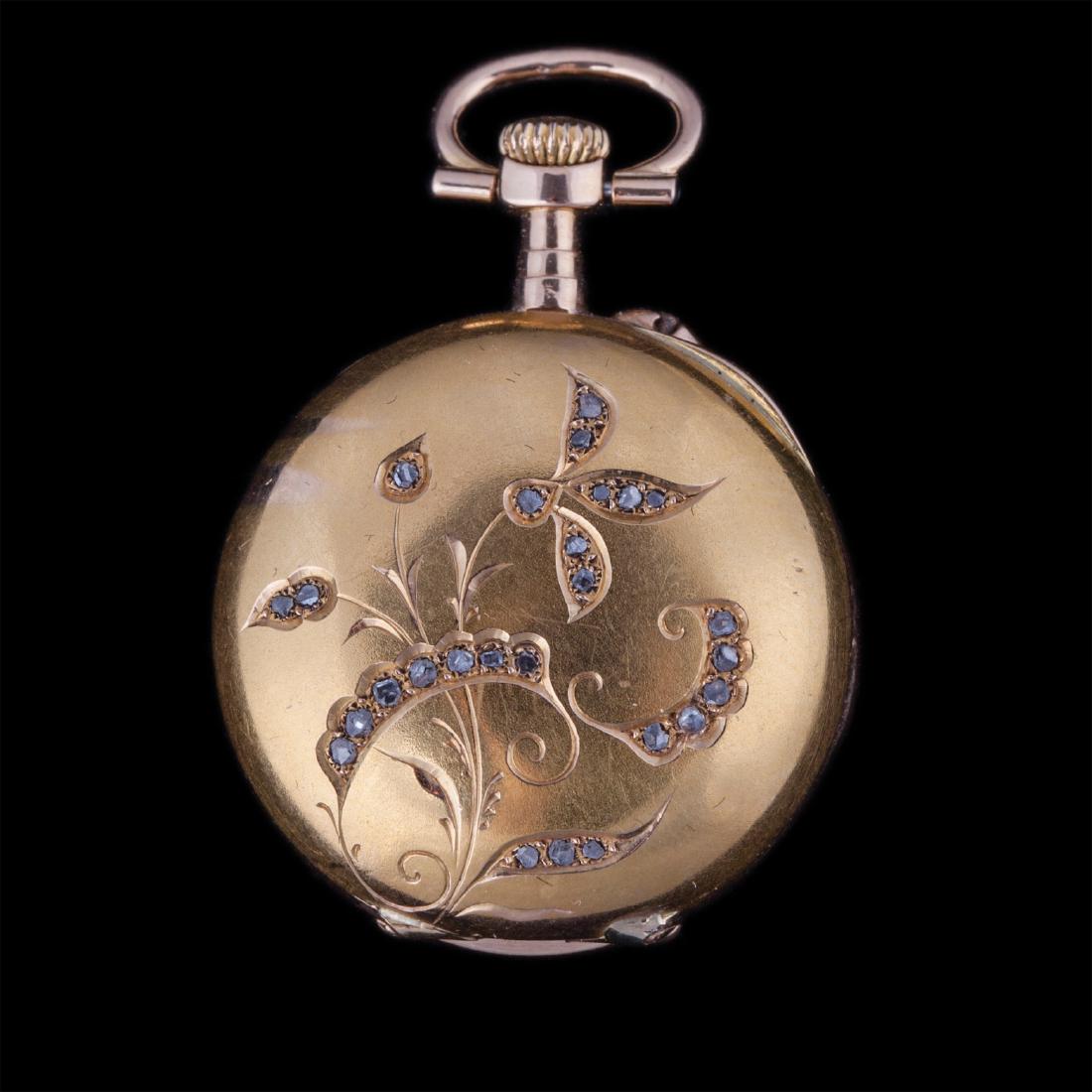 Gold open face pocket watch with jewels — image 1