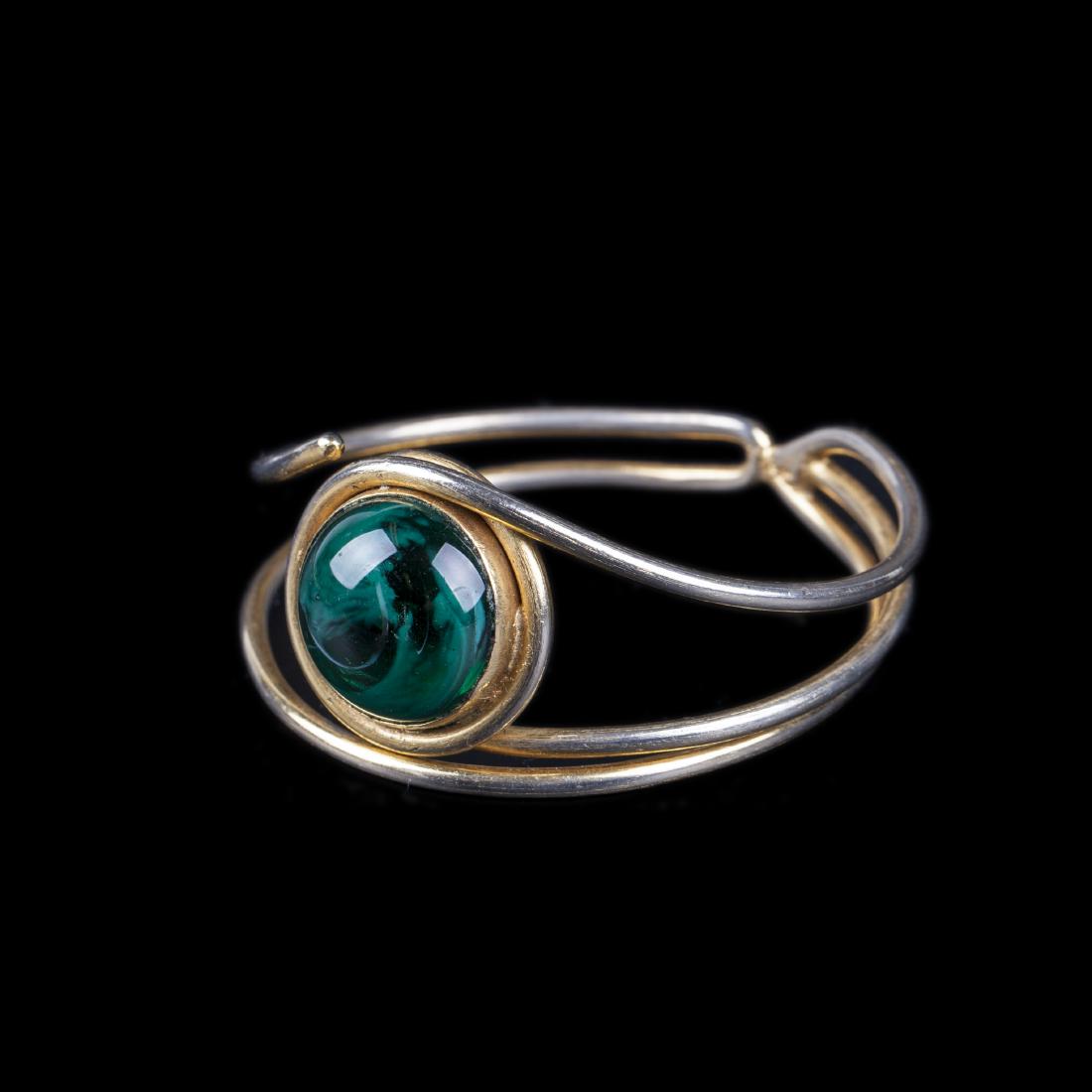 Yves Saint Laurent bracelet with green glass inlay. — image 1
