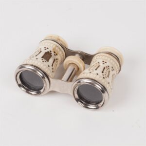 Opera glasses with bone. — image 1