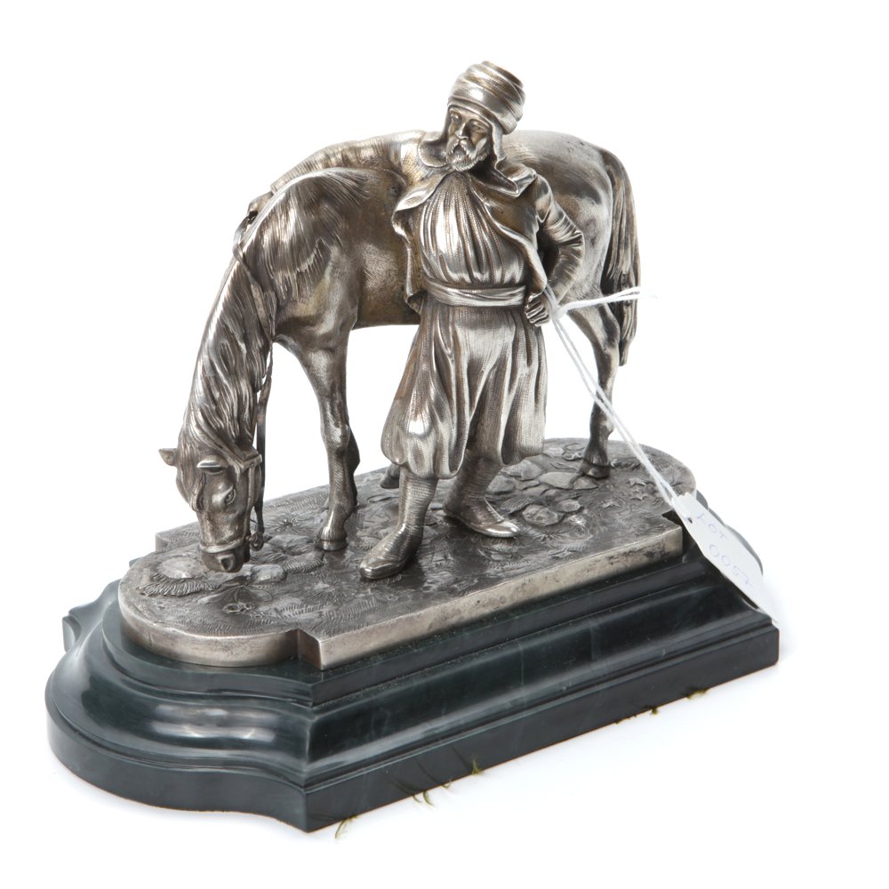 Russian silver horseman figure. — image 1