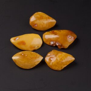 Set of antique amber brooches. — image 1