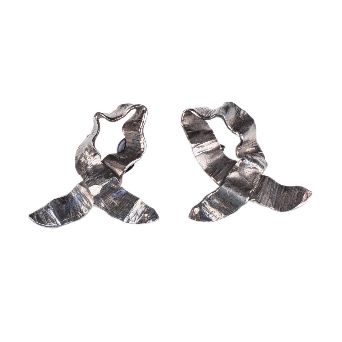 Yves Saint Laurent earclips. 1980s. — image 1