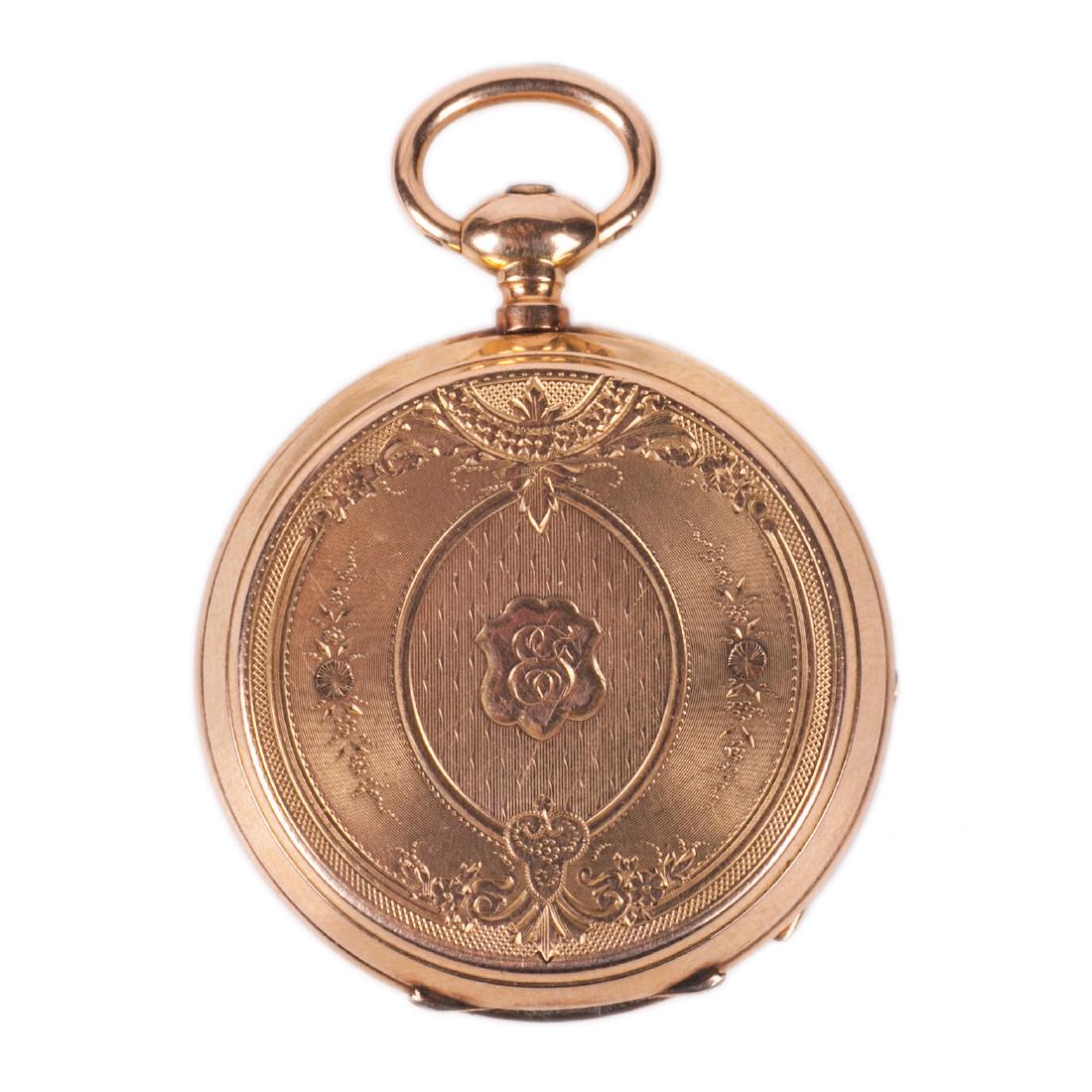 Gold open face pocket watch — image 1