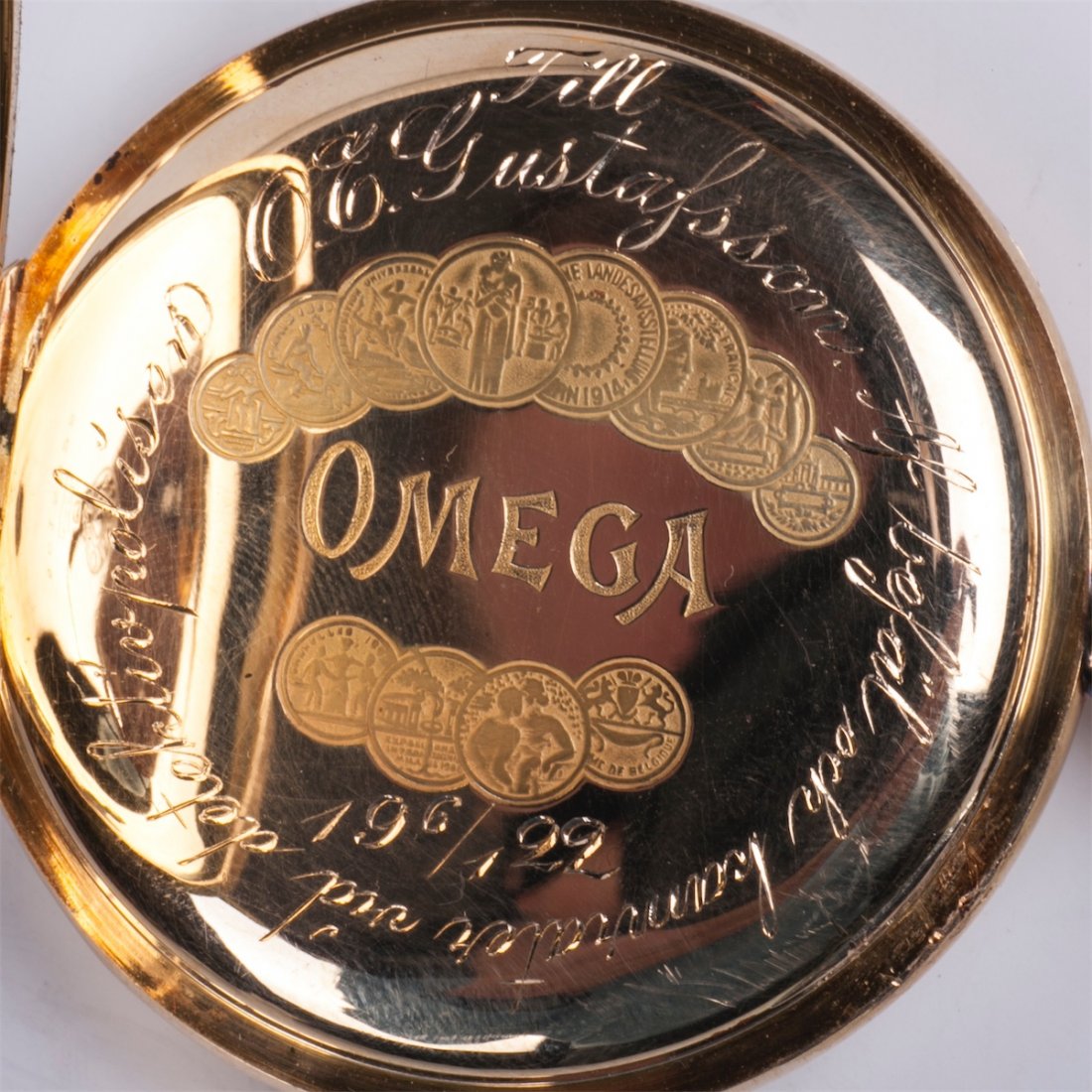 Gold open-face pocket watch "Omega" with a gold chain — image 4