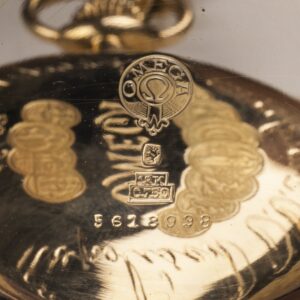 Gold open-face pocket watch "Omega" with a gold chain — image 5