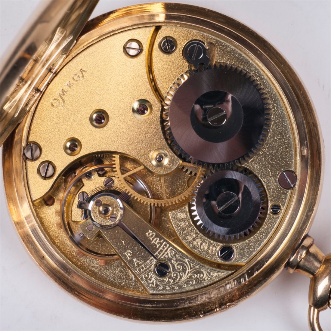 Gold open-face pocket watch "Omega" with a gold chain — image 6