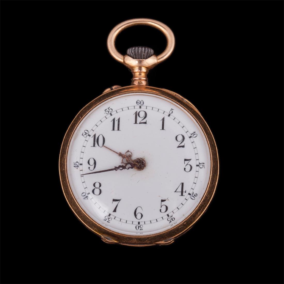 Open face gold pocket watch — image 1