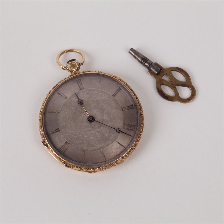 Gold pocket watch with keys. — image 1