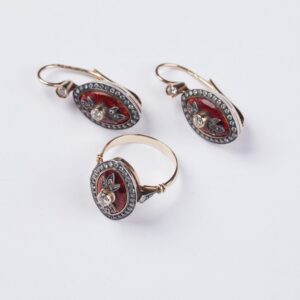 Gold earrings and ring. — image 2
